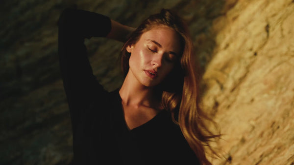 Woman on beach in Rowan Fall collection